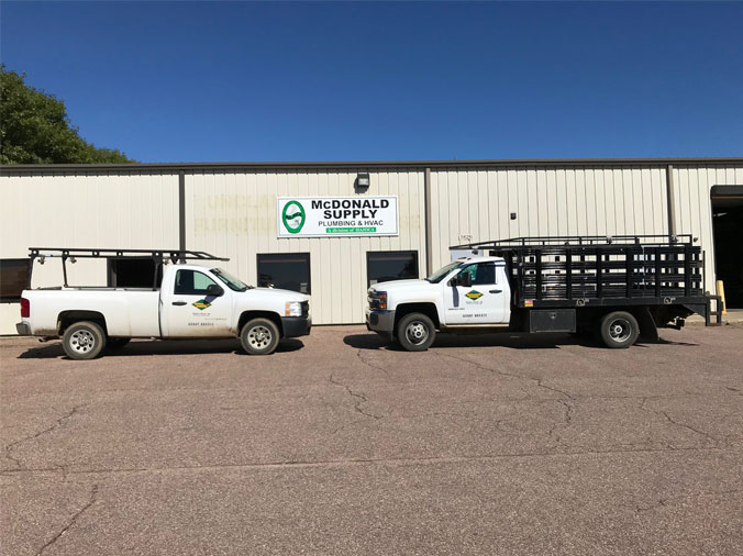McDonald Plumbing Supply Souix Falls South Dakota building exteropr with delivery trucks